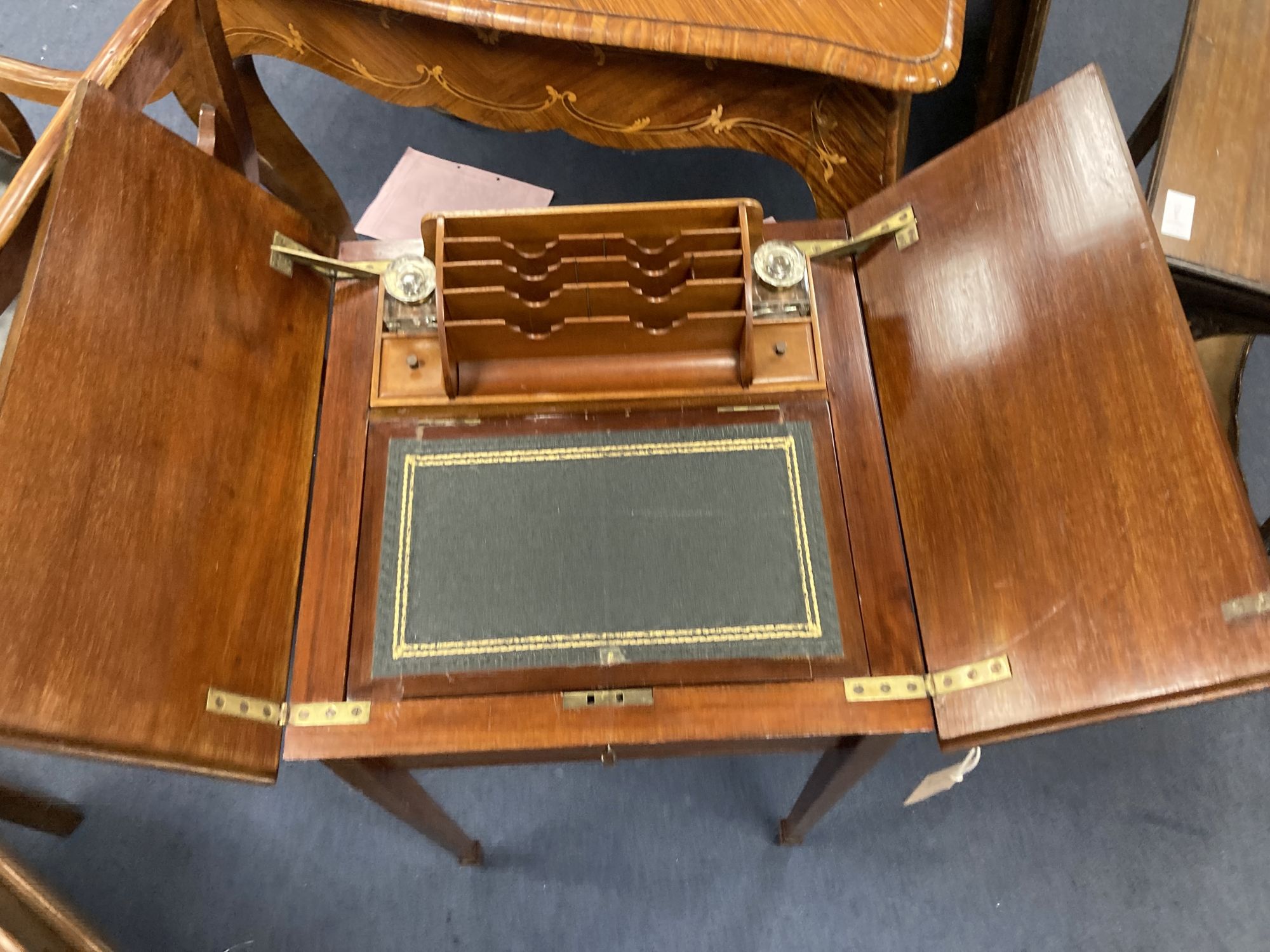 An Edwardian inlaid mahogany surprise writing table, width 48cm depth 49cm height 73cm